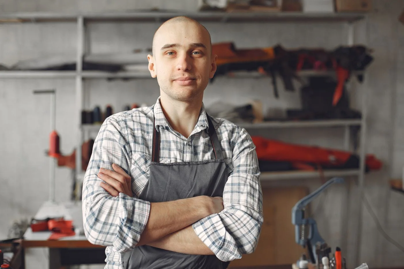 An artisan standing in a workshop