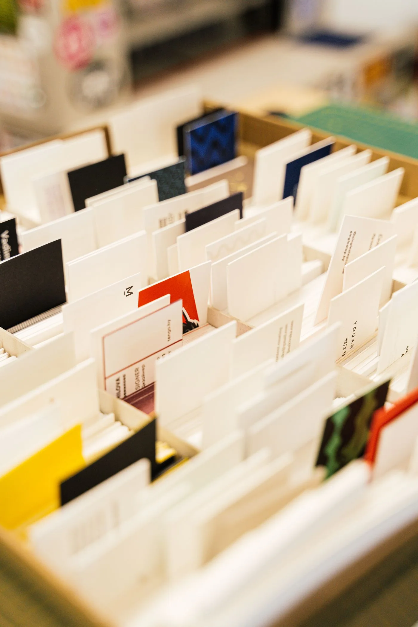 Business cards arranged in a box
