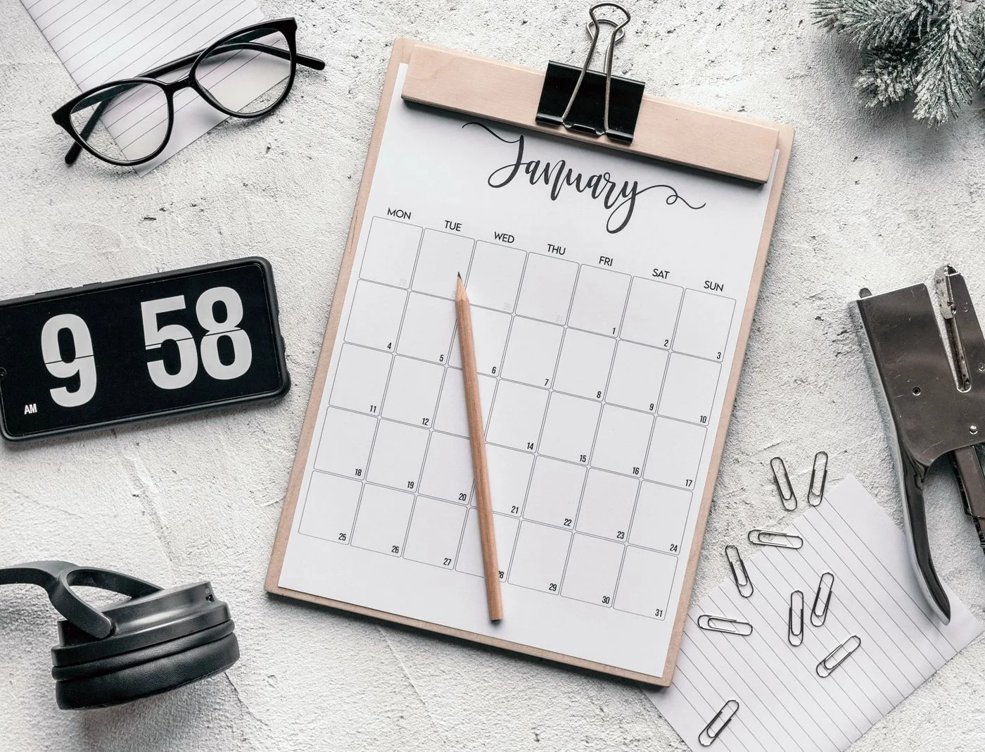 Calendar on a clipboard with stationery