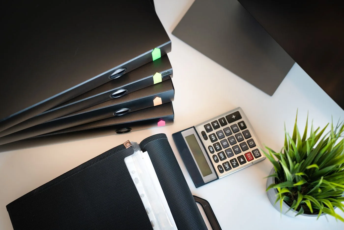 Organised business files on a desk