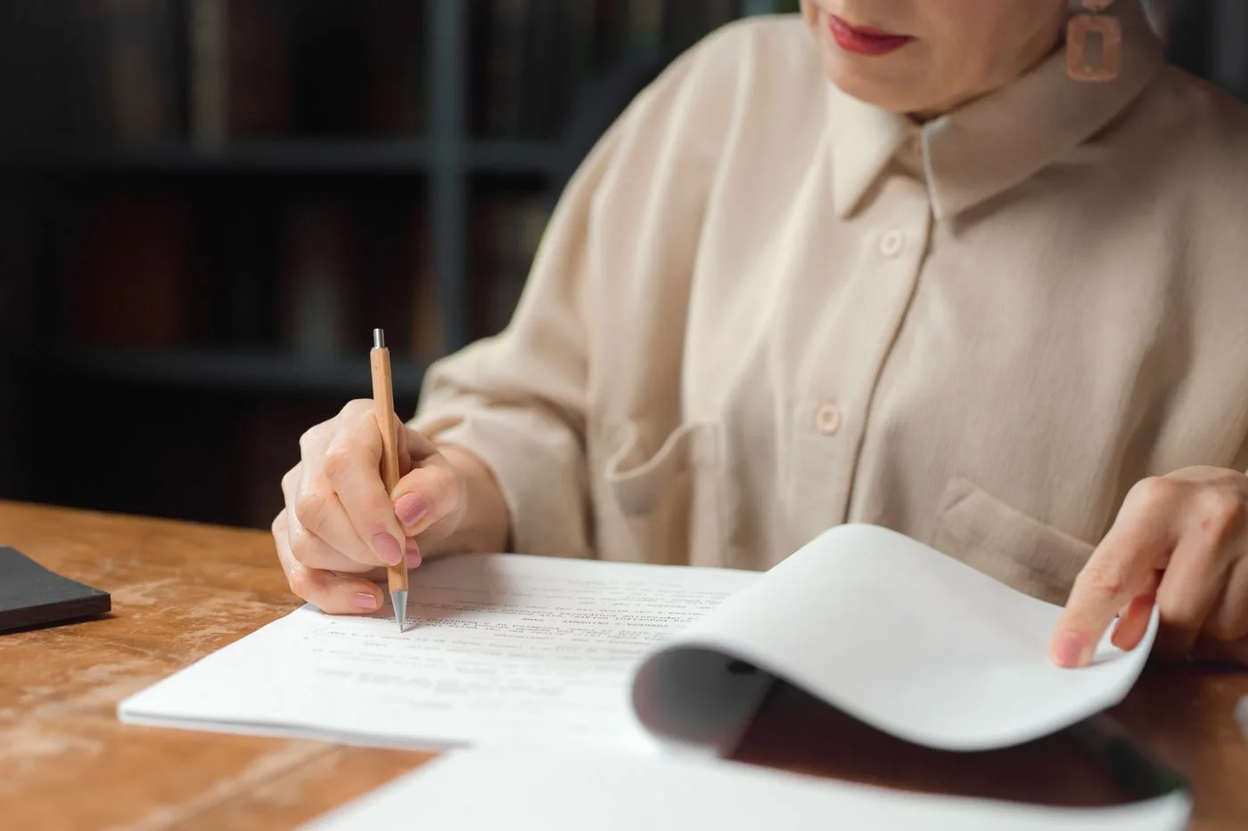 Reviewing written documents at a desk