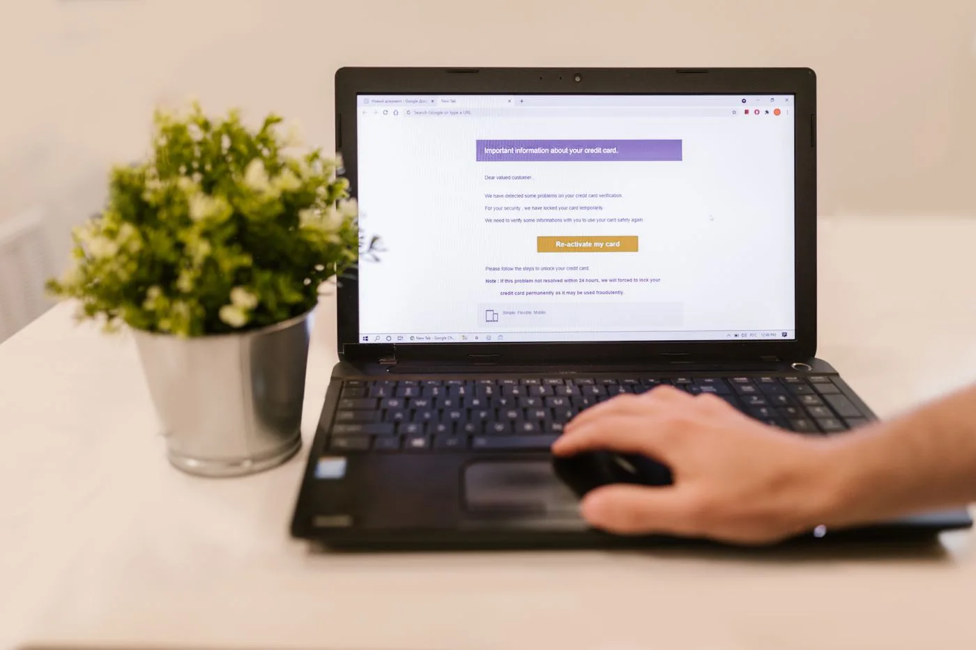 Reading an email on a laptop