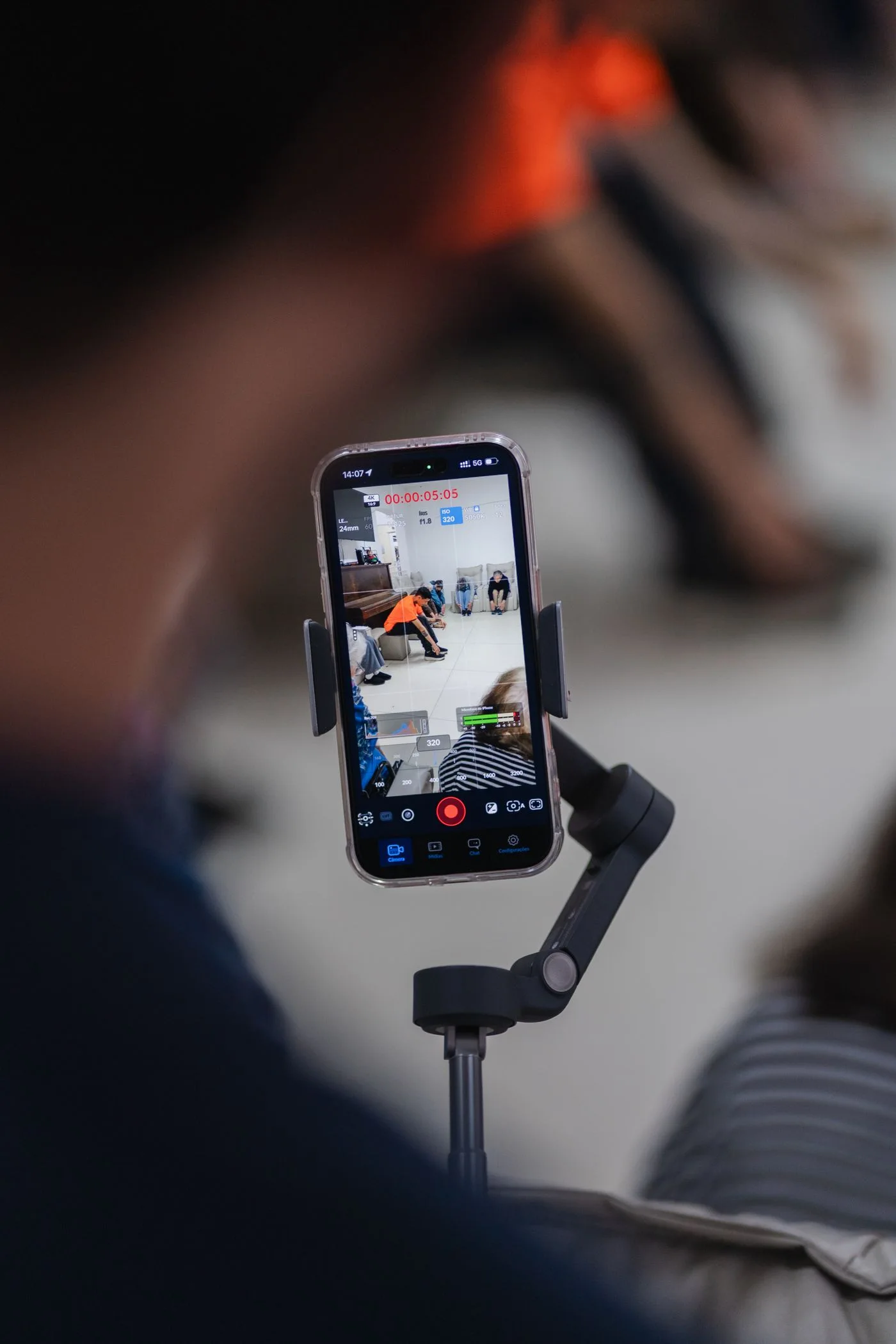 A smartphone recording a workshop session