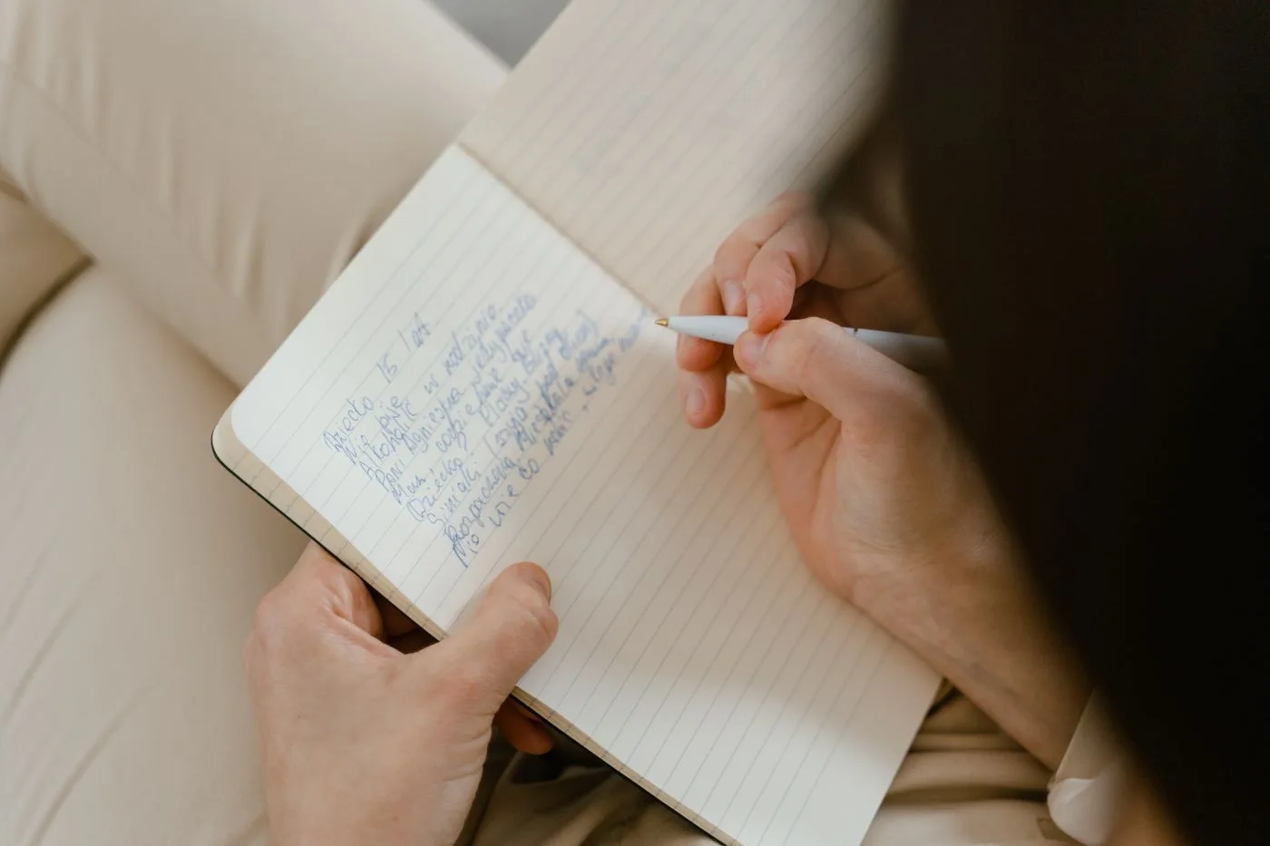 Writing ideas in a notebook