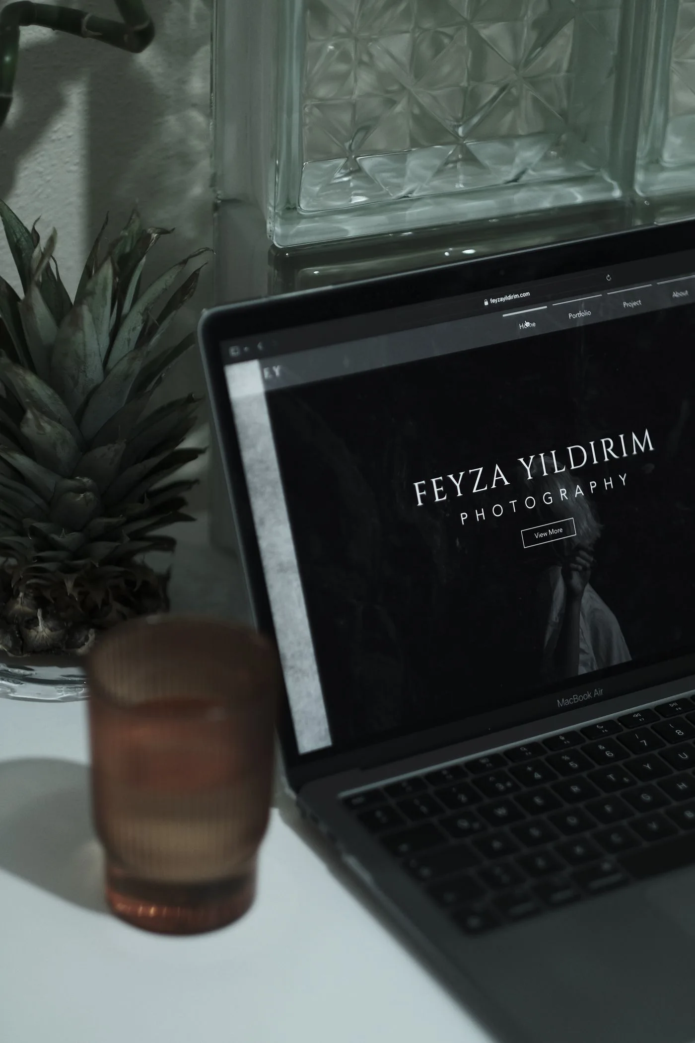 A portfolio website displayed on a laptop