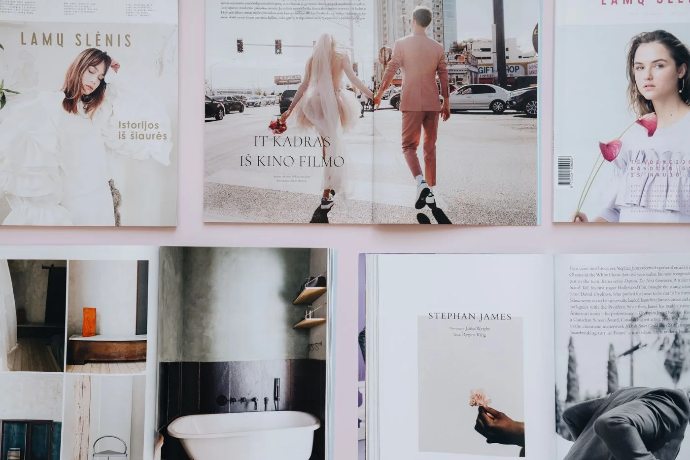 Printed magazine pages with editorial layouts