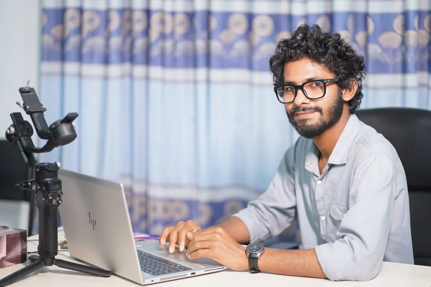 A web developer working on a laptop